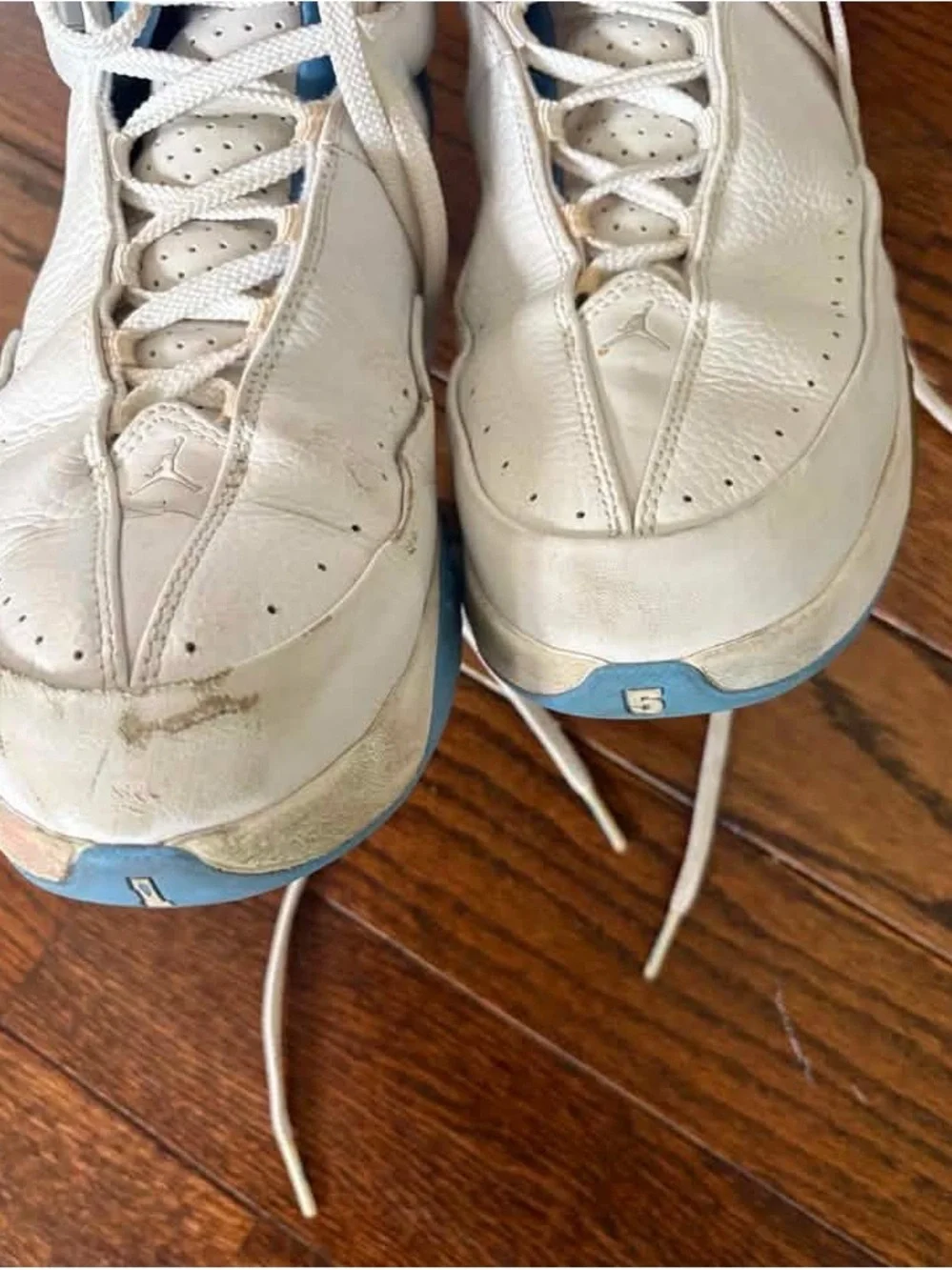 Jordan White with Light Blue High-Top Basketball Sneakers
